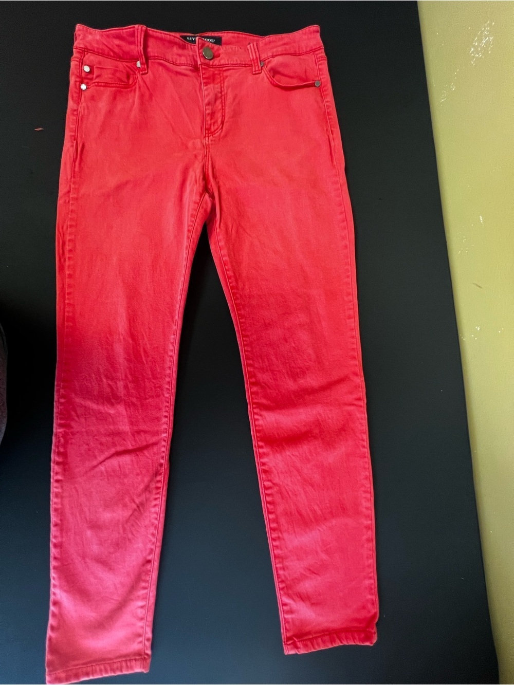 LIVERPOOL CORAL COLORED SIZE 8 ANKLE SKINNY STRETCH DENIM W/FRONT ZIPPER.